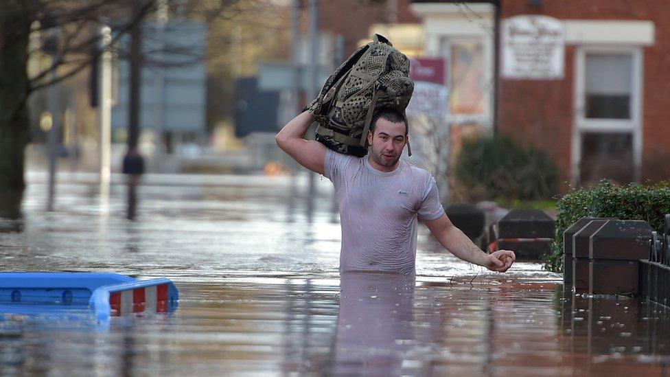 Man evacuating home