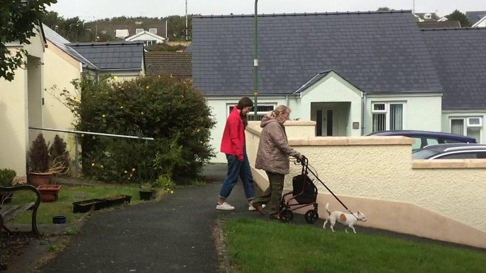 Kelly Dixon and Gaynor Lynch take pet dog Pudding for a walk