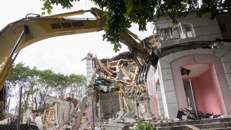 A wrecking crew demolishes the mansion once owned by Colombian drug lord Pablo Escobar in Miami Beach, Florida, USA, 19 January 2016.