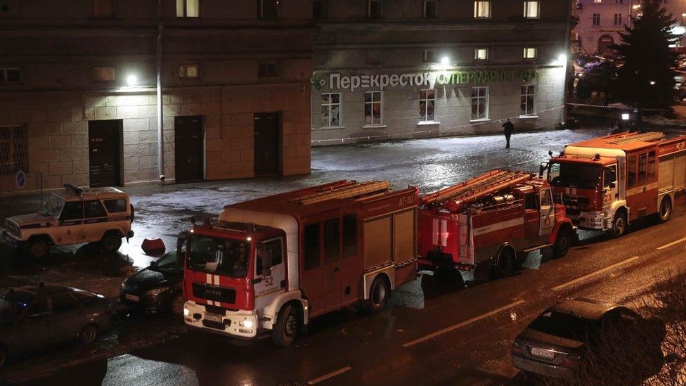 Vehicles of emergency services are parked near a supermarket after an explosion in St Petersburg, Russia 27 December 27