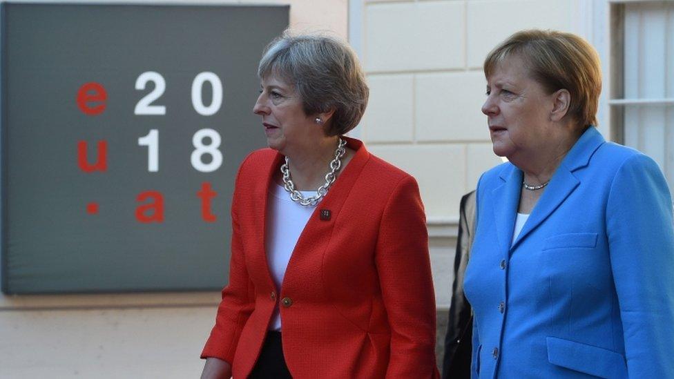 Theresa May and Angela Merkel