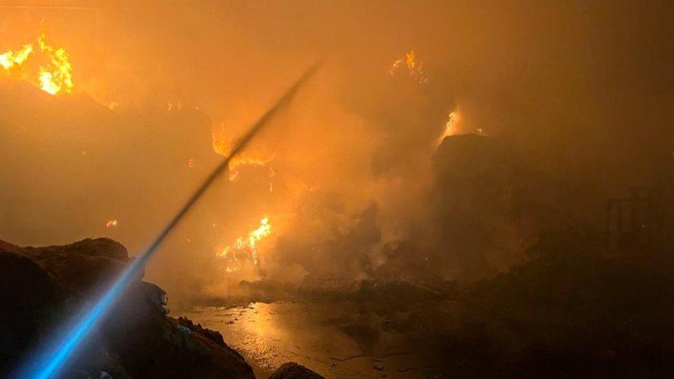 Straw on fire in a barn