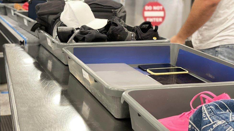 trays-at-security-check-with-items.