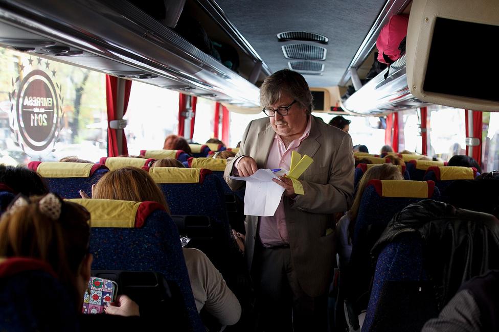 Manolo Gozalo checks tickets