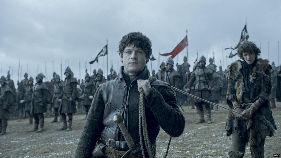 Iwan Rheon as Ramsay Bolton and Art Parkinson as Rickon Stark