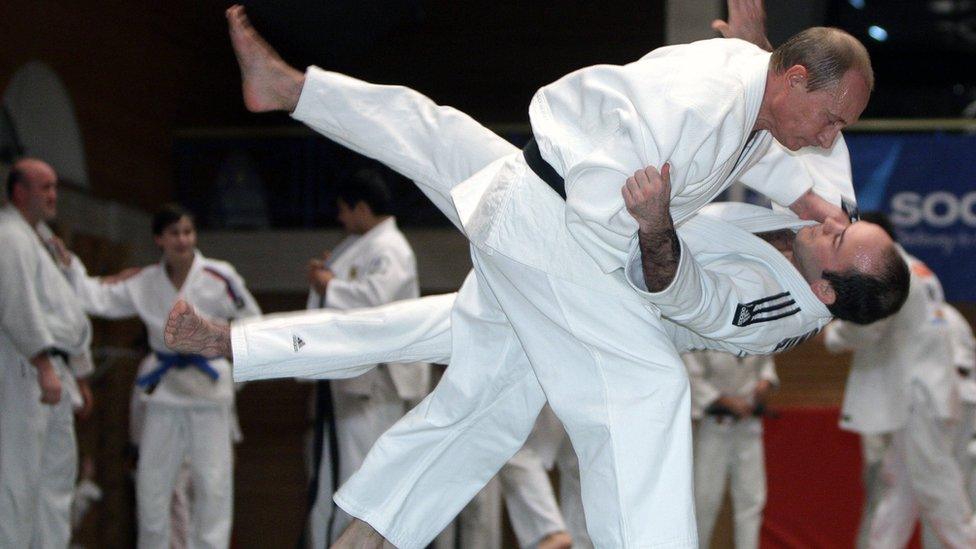 Russian Prime Minister Vladimir Putin takes part in a judo training session during his working visit to St Petersburg on 18 December 2009