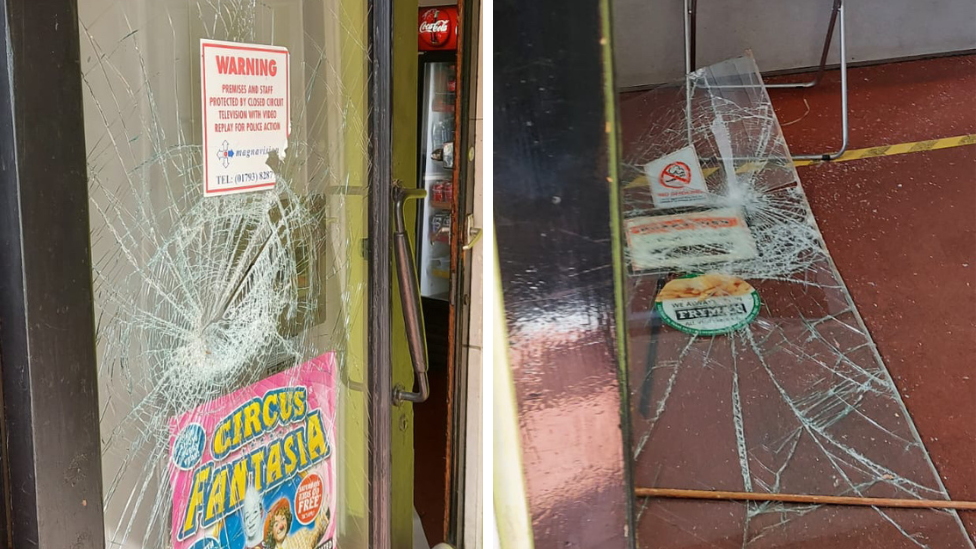 Smashed and broken doors at Small Fry takeaway