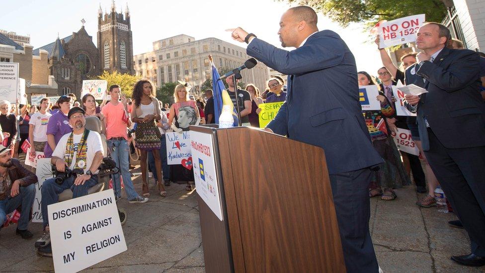 Jody Owens, managing attorney for the Southern Poverty Law Center in Mississippi, addresses a crowd against House Bill 1523 outside the governor's office