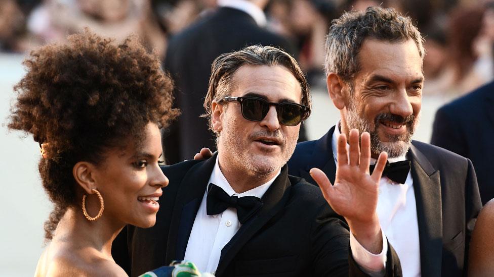 Zazie Beetz, Joaquin Phoenix and Todd Phillips