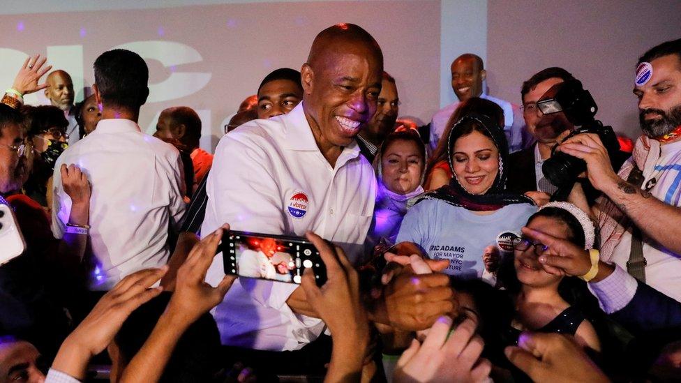 eric adams greets supporters