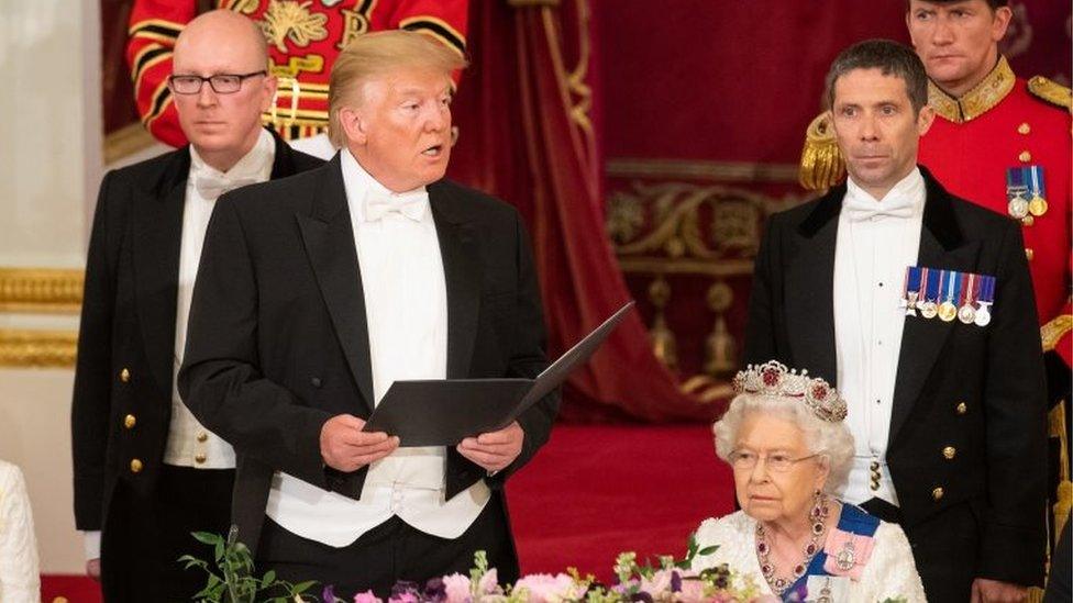 US President Donald Trump makes a speech as Queen Elizabeth II listens during a State Banquet at Buckingham Palace on3 June 2019 in London, England