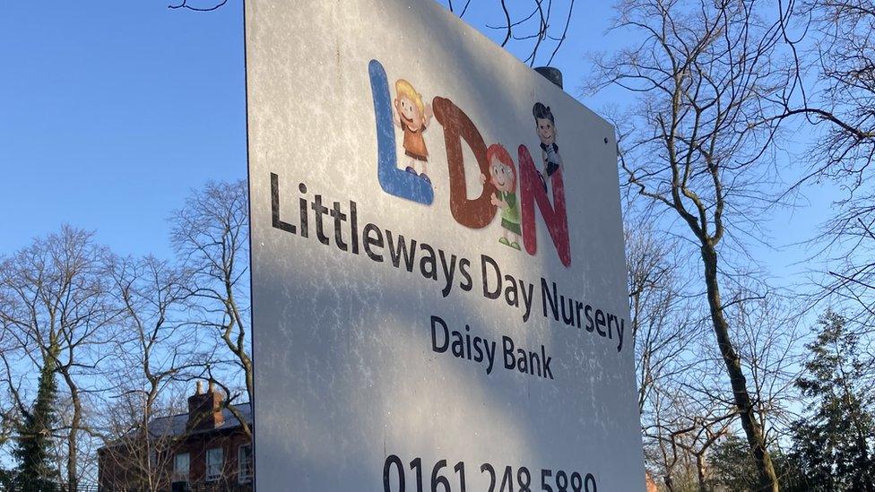 A sign of the Littleways Day Nursery in its playground.