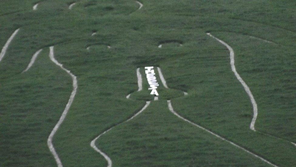 Cerne Giant with Theresa graffiti