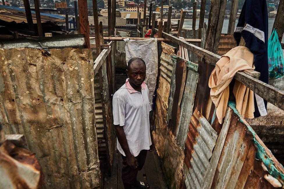 J Roberts in his washing facility