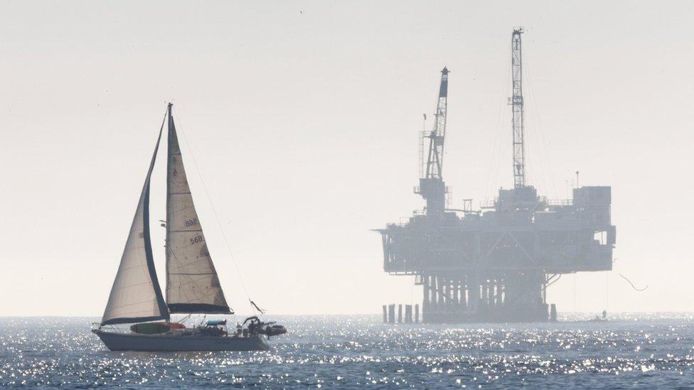 An oil rig is seen off the Pacific Ocean coastline after the Trump administration announced plans to dramatically expand offshore drilling, at Seal Beach, California, USA, 4 January 2018