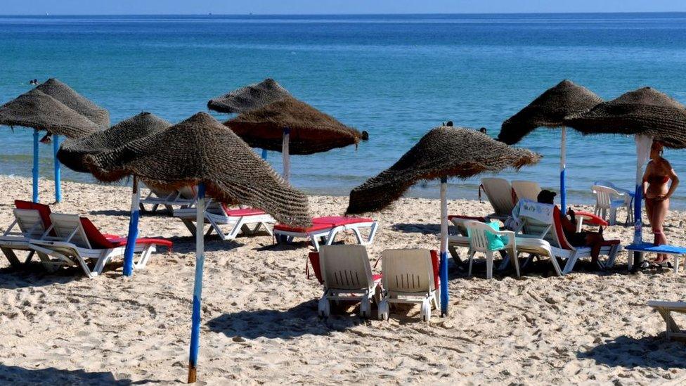 Tourists on a beach in Tunisia - July 2021