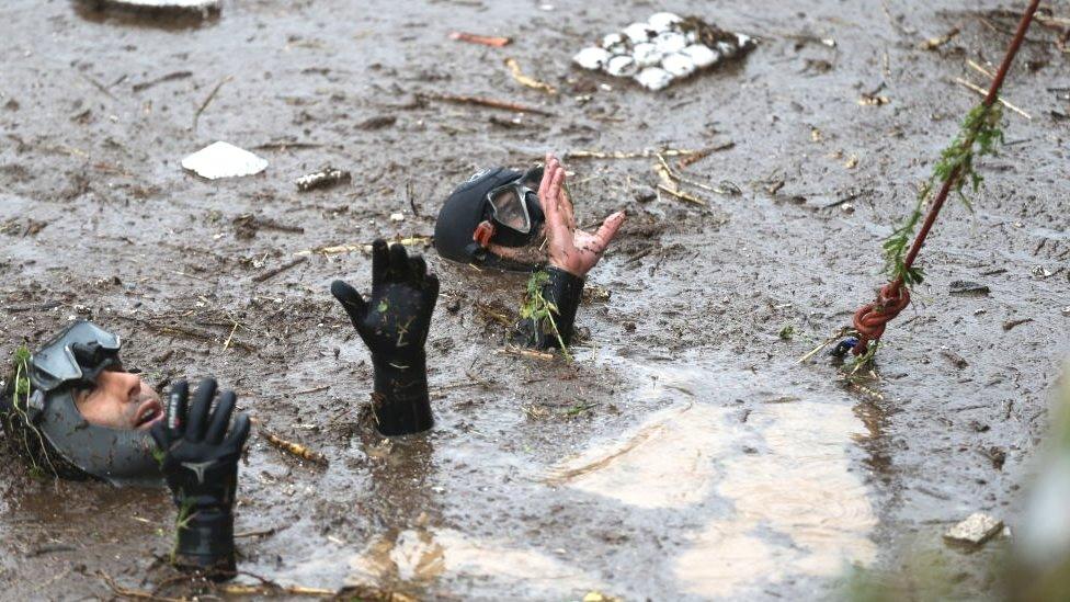 Police divers, also known as frogmen, of Turkish Police Department conduct search and rescue operations at the flooded crossroads after downpour hit Sanliurfa, Turkiye on March 15, 2023