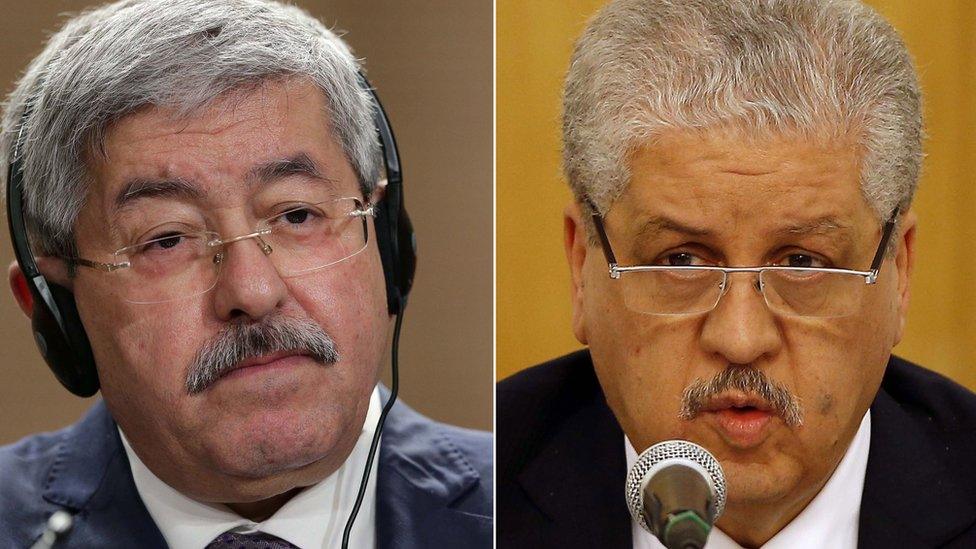 former Algerian Prime Ministers Ahmed Ouyahia (L) and Abdelmalek Sellal