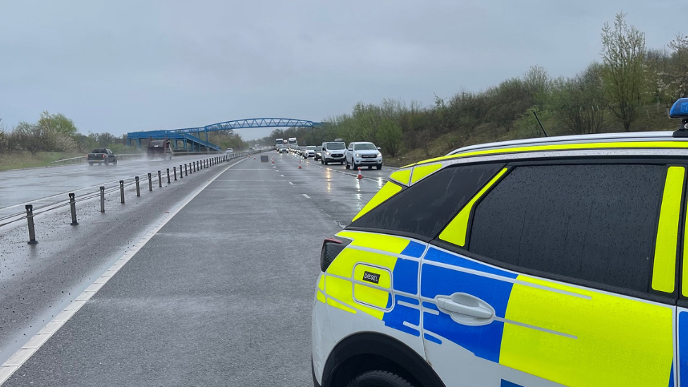 Police car on the A428