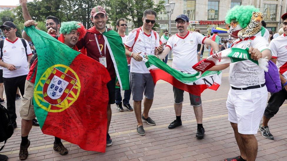 Iranian and Portuguese fans ahead of their team's game 25 June 2018