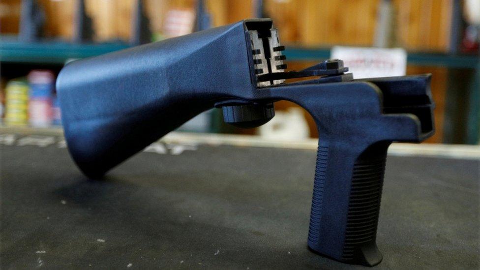 A bump fire stock that attaches to a semi-automatic rifle to increase the firing rate is seen at Good Guys Gun Shop in Orem, Utah, U.S., October 4, 2017