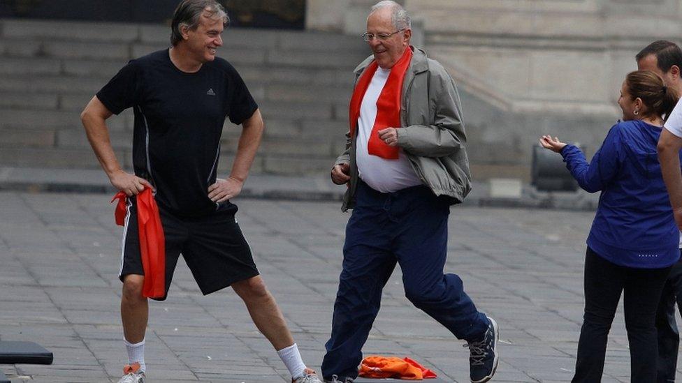 Peruvian President Pedro Pablo Kuczynski (C) exercises at the government palace in Lima, Peru August 4, 2016