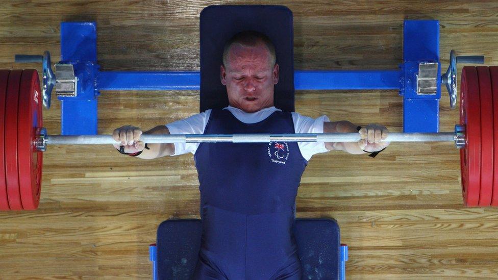 Jason Irving of Great Britain lifts in the Men's -56 kg during the Powerlifting at the Beijing University