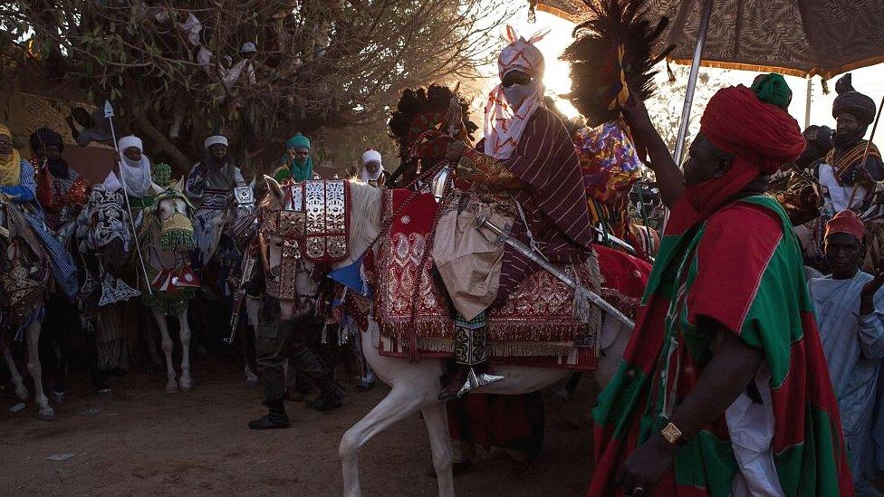 Emir of Kano on horseback at a durbar for his coronation in 2014 in Kano, Nigiera