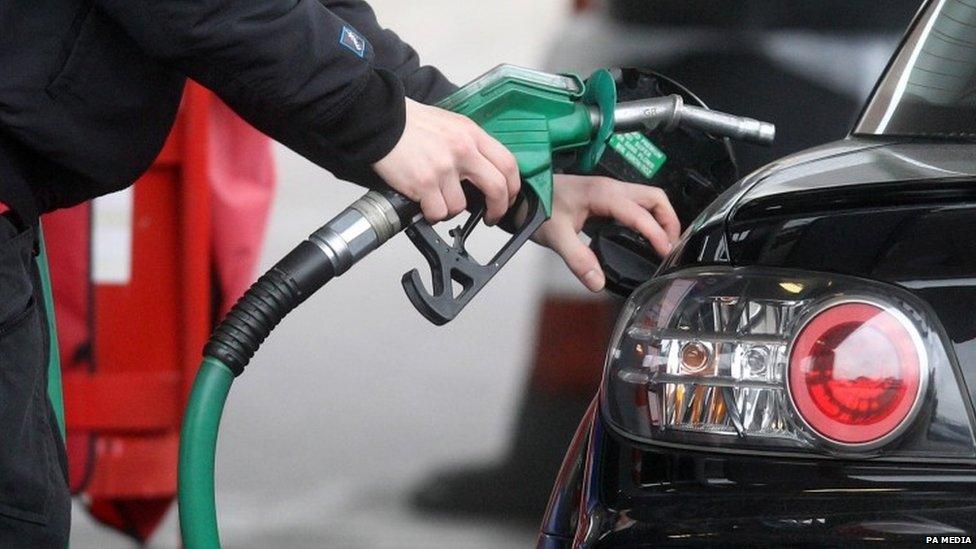 Motorist filling up his tank