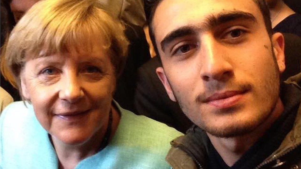 Anas Modamani with Angela Merkel