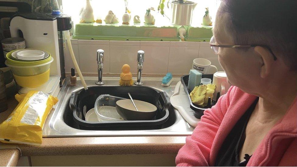 Susie in her kitchen