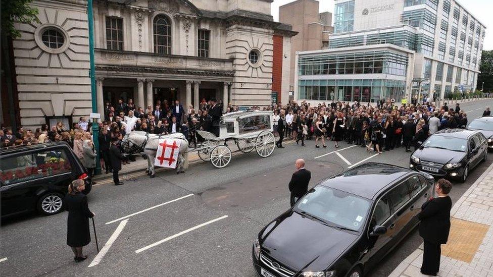 Crowds gathered to pay their respects