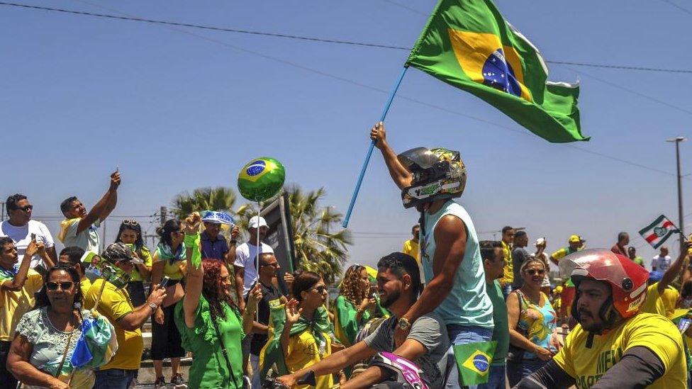 At a rally for President Bolsonaro on Tuesday, the national colours featured heavily