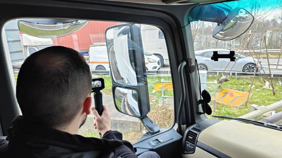 Police officer in unmarked vehicle