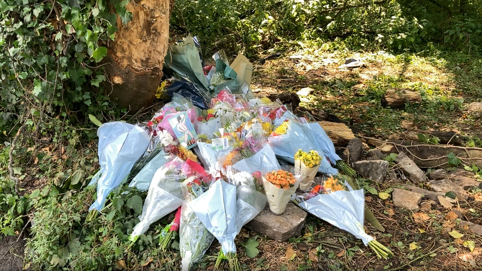 Flower tributes for the victims.