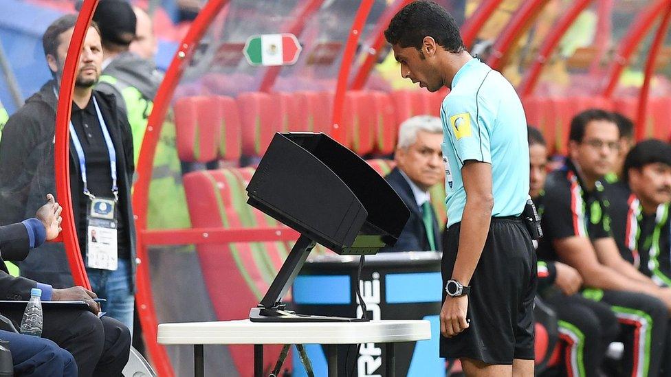 A Video Assistant Referee at the 2017 Confederations Cup