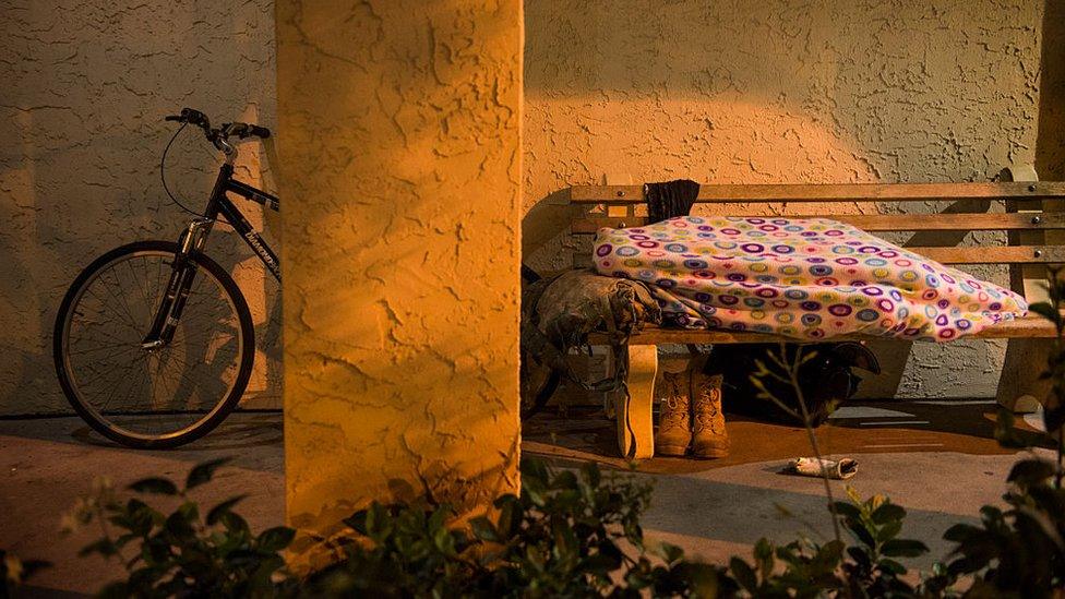 Homeless men and women sleep outside in Sarasota, Florida