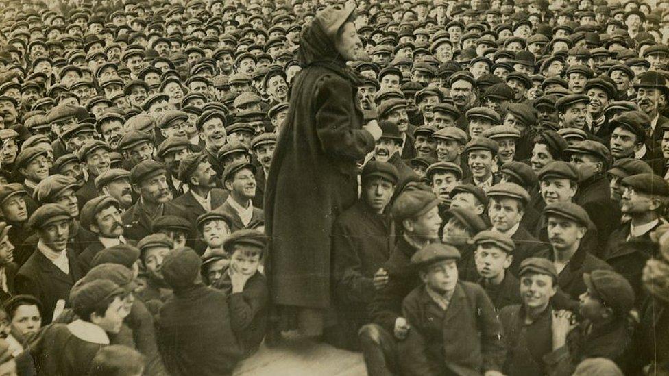 Katherine Douglas Smith speaking to a crowd of men (taken between 1906-1914)