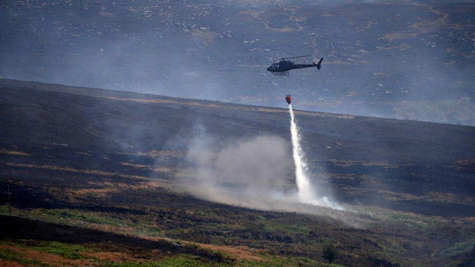 Helicopter working at Saddleworth Moor