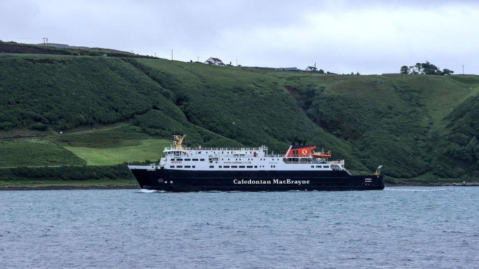 A view of the Calmac Ferry leaving for North Uist in the Outer Hebrides from the port of Uig at the North Western tip of the Island of Skye