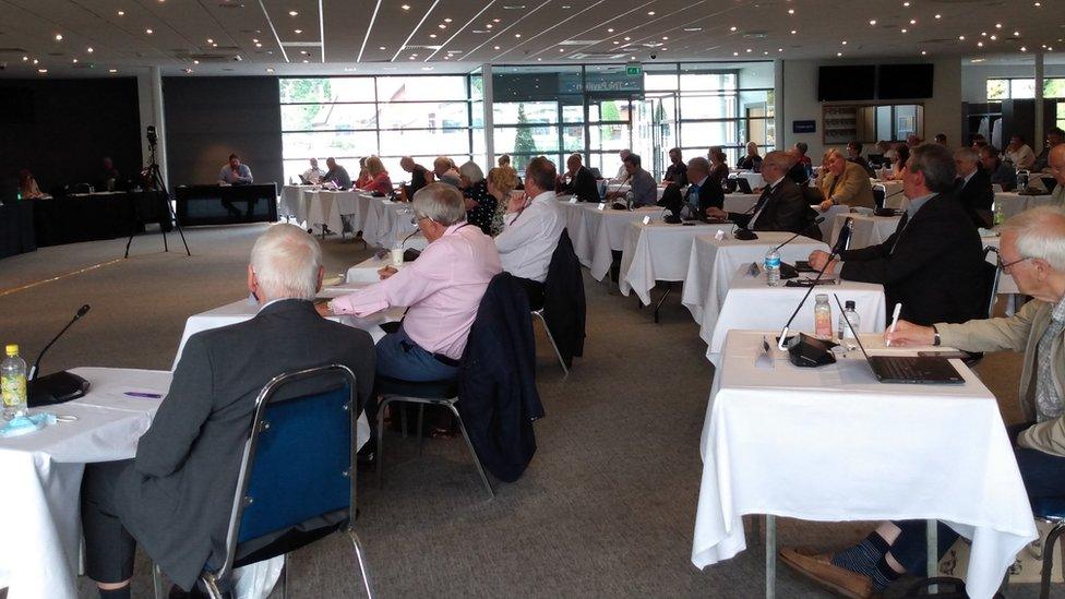 Councillors gathered for a special in person meeting at Chester Racecourse pavilion