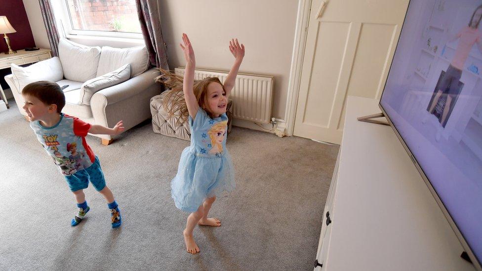 two-kids-working-out-in-fancy-dress