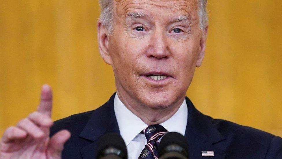 Biden announced sanctions on Russia after Moscow's order to deploy troops to eastern Ukraine.