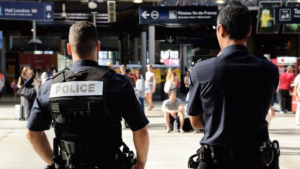 French police officers patrol at Gare du Nord train station in Paris (22 August 2015)