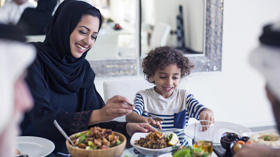 Muslim family at the dinner table