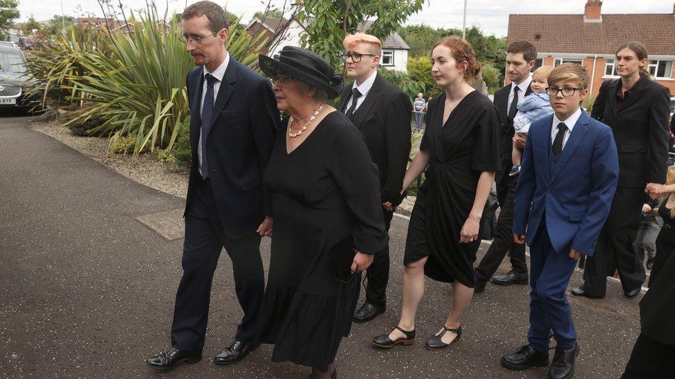 Daphne Trimble (front right) and members of the Trimble family, arrive for the funeral on Monday