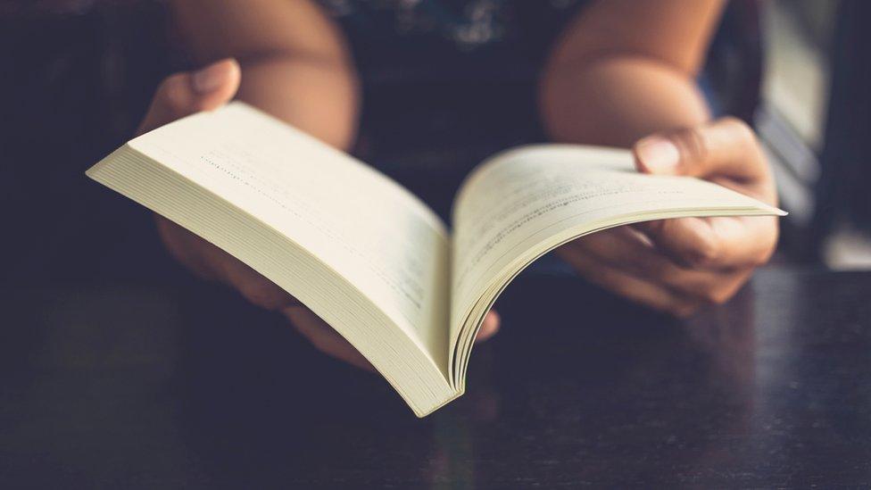 Person reading book