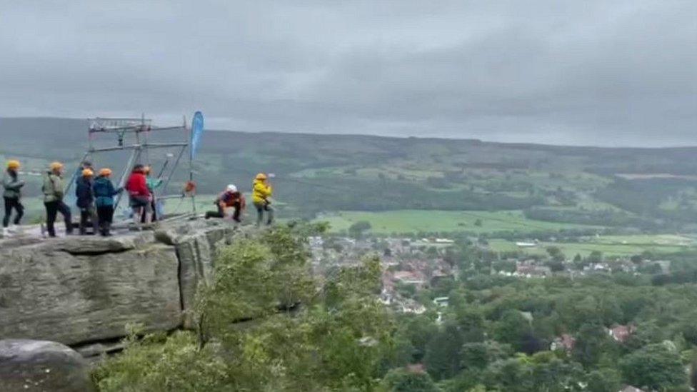 People about to ride the zip wire