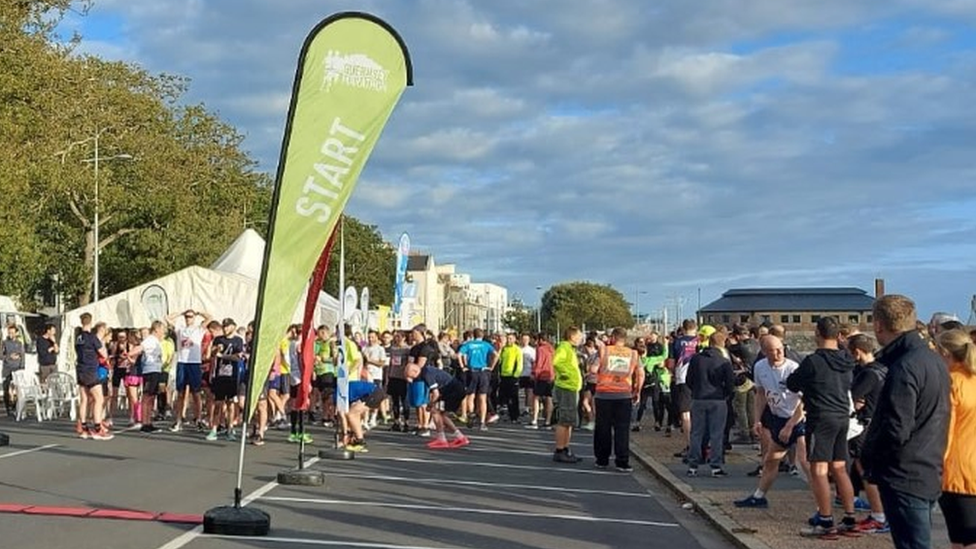 Runners at the start of the marathon in Guernsey