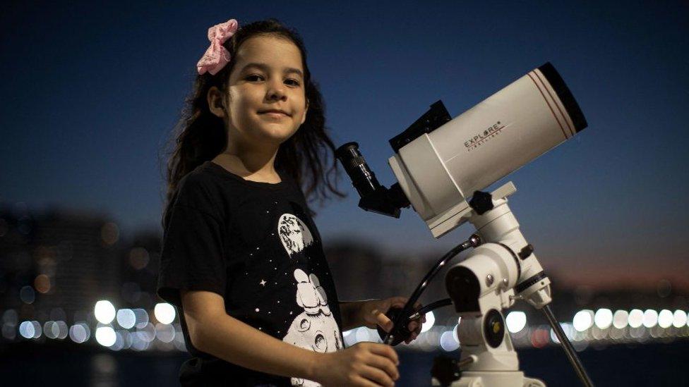 Nicole and her telescope